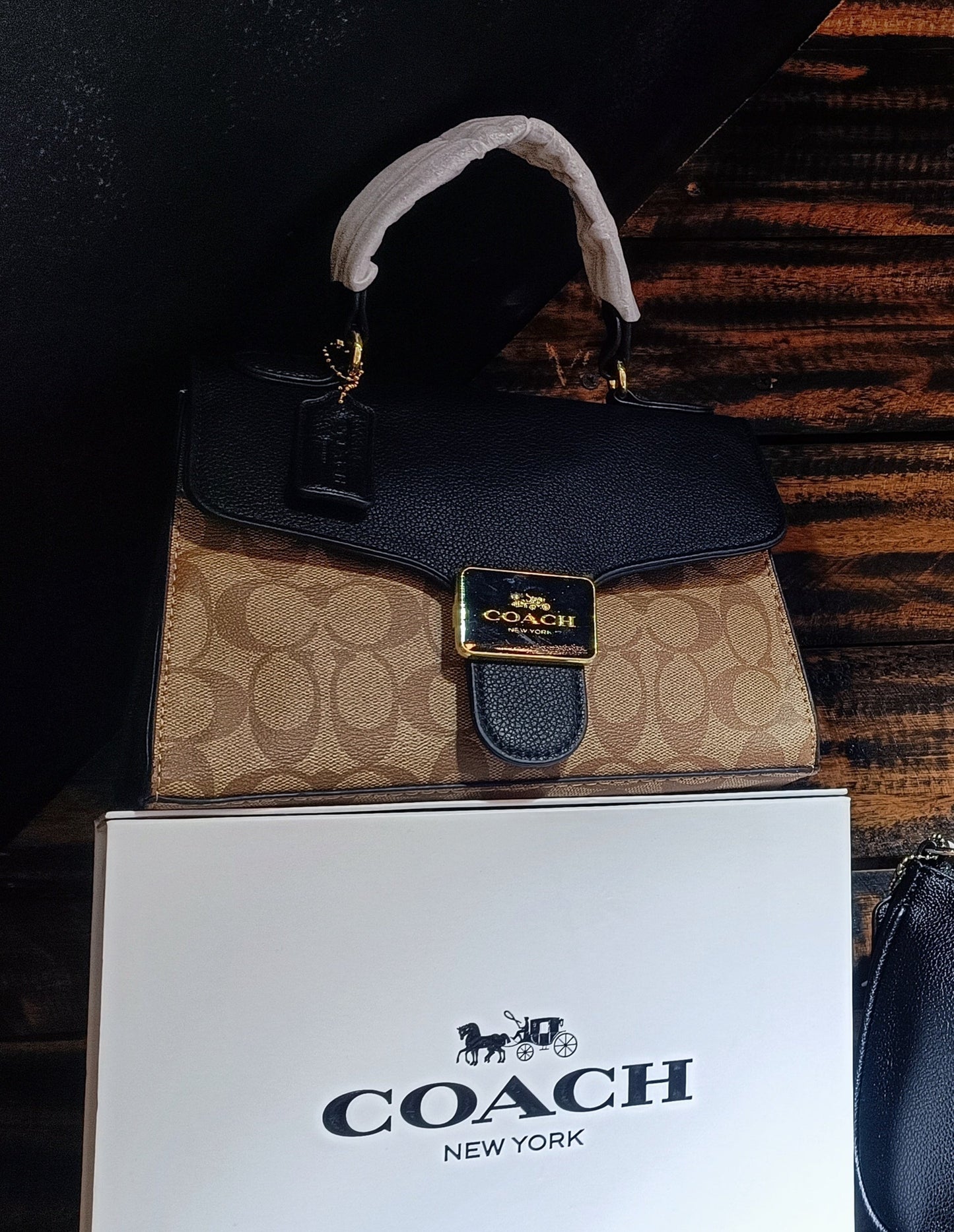 BOLSO COACH NEGRO CAFE