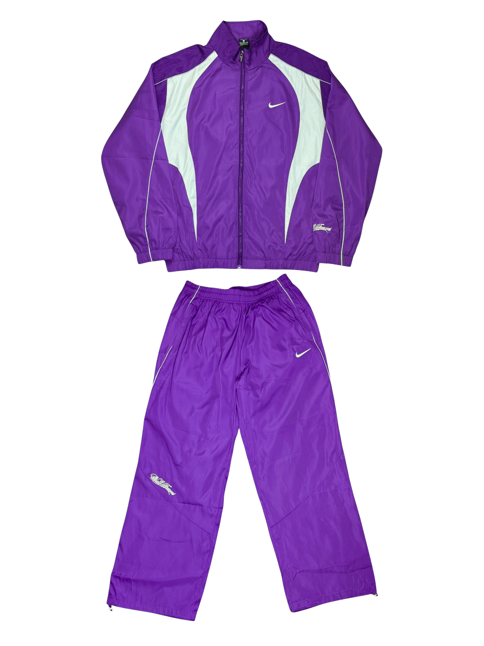 CONJUNTO NIKE WORLD MORADO TR1
